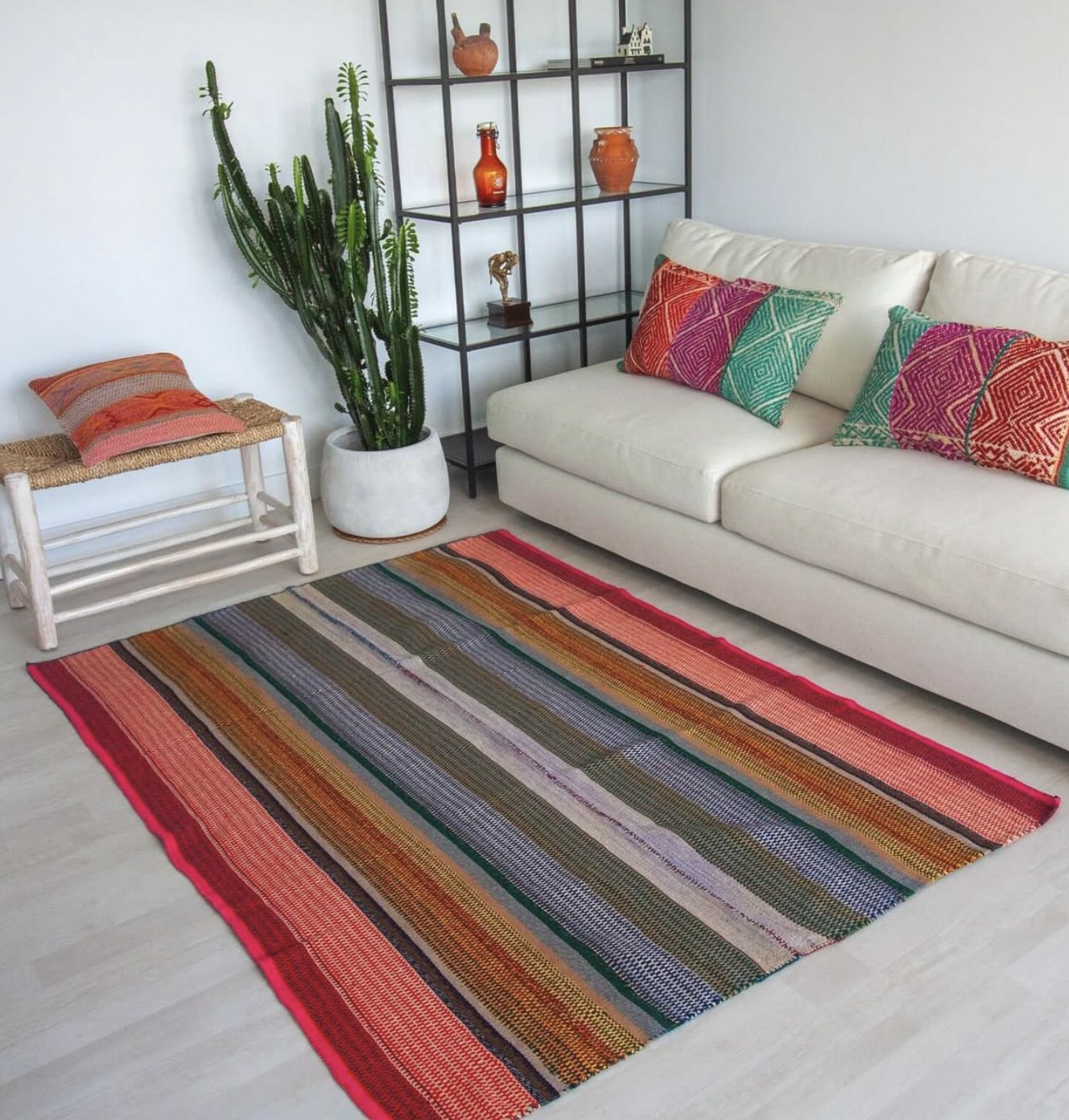 A whole frazada textile styled flat as a rug in a living room